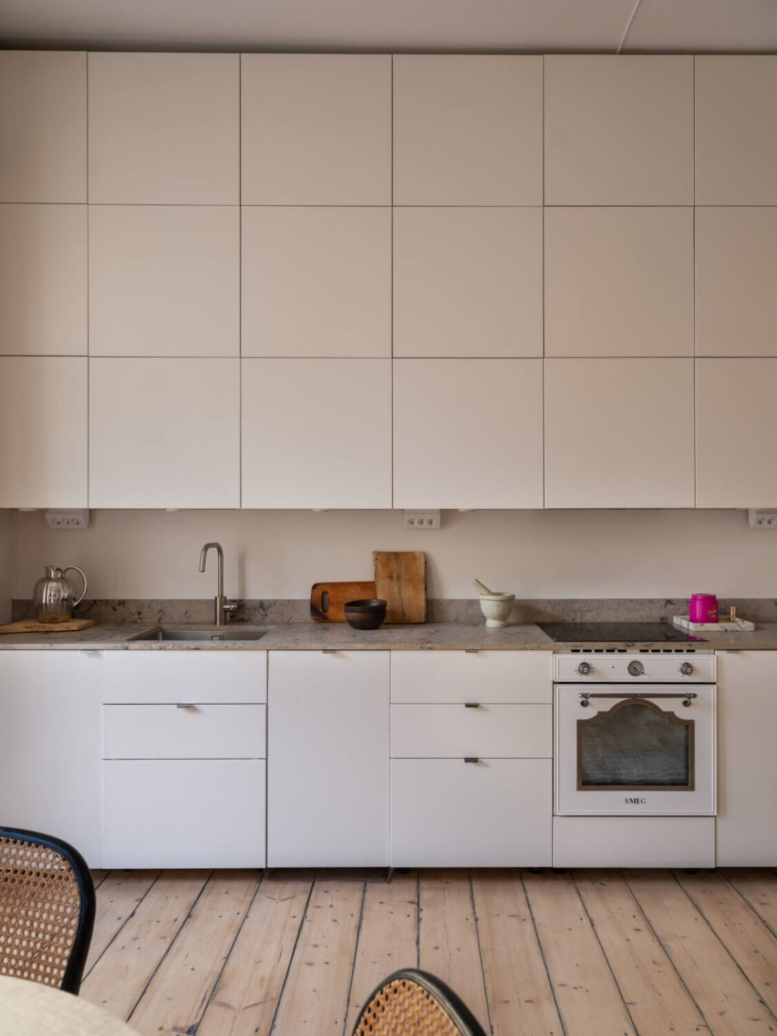 A Small Apartment with Contemporary Furniture in a 19th-Century Building 11 white kitchen