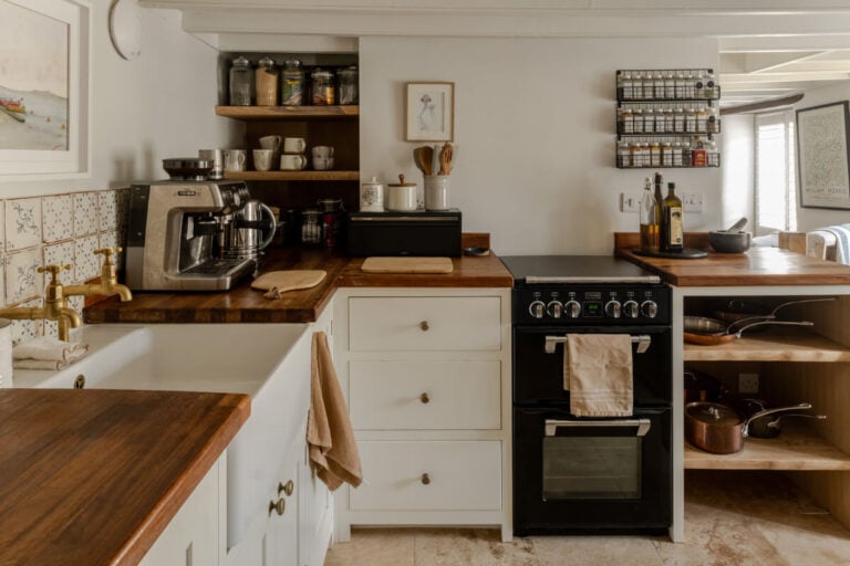 white kitchen antique tiles wooden countertop
