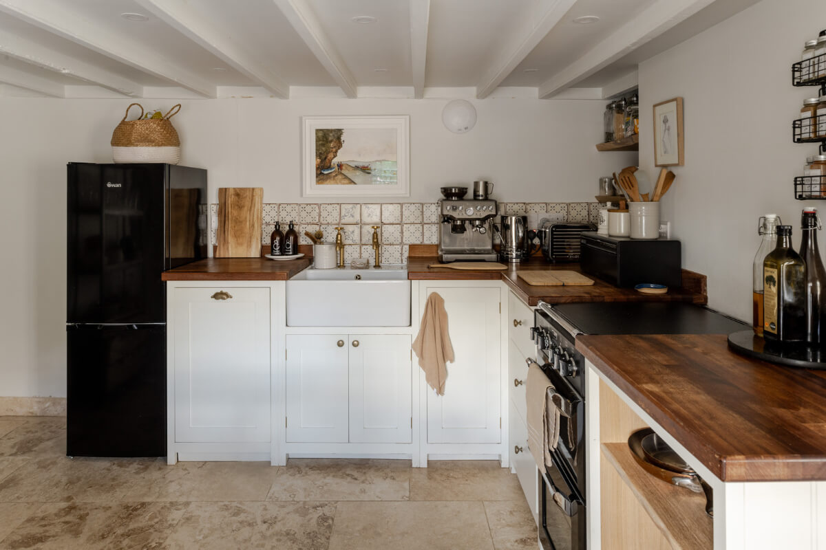 white kitchen low ceiling butler sink