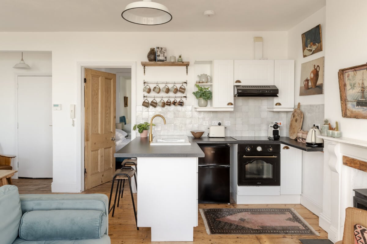 A Small Victorian Apartment by the Sea in Cornwall 10 white kitchen zellige backsplash tiles