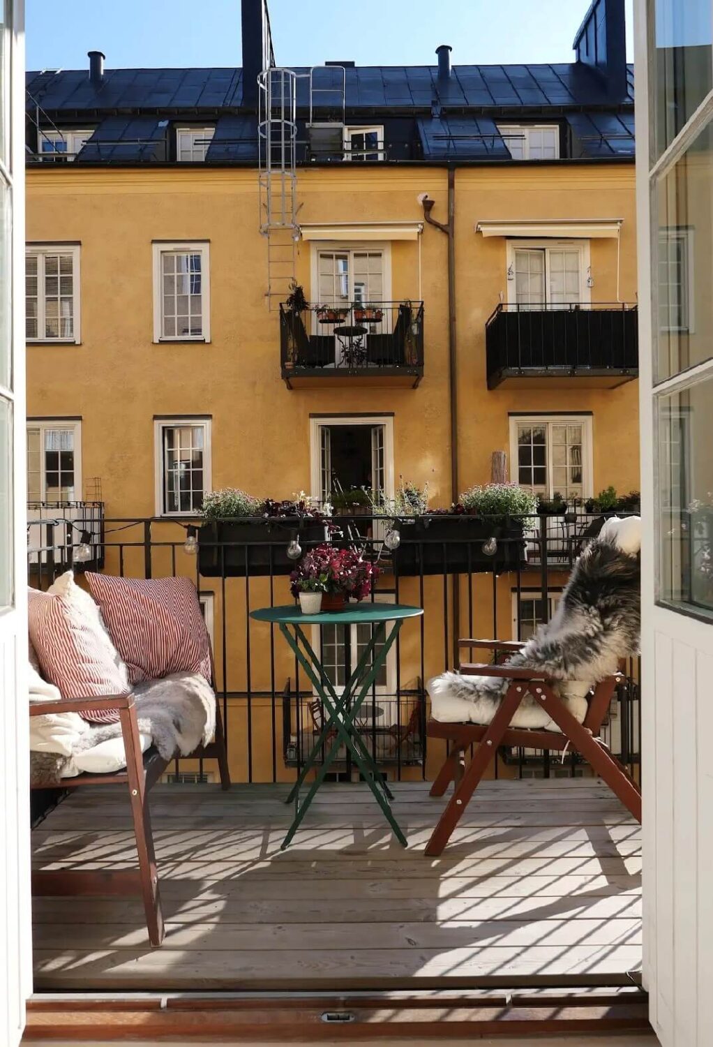 A Muted Palette and a Cozy Kitchen Breakfast Nook in a Swedish Apartment 18 balcony
