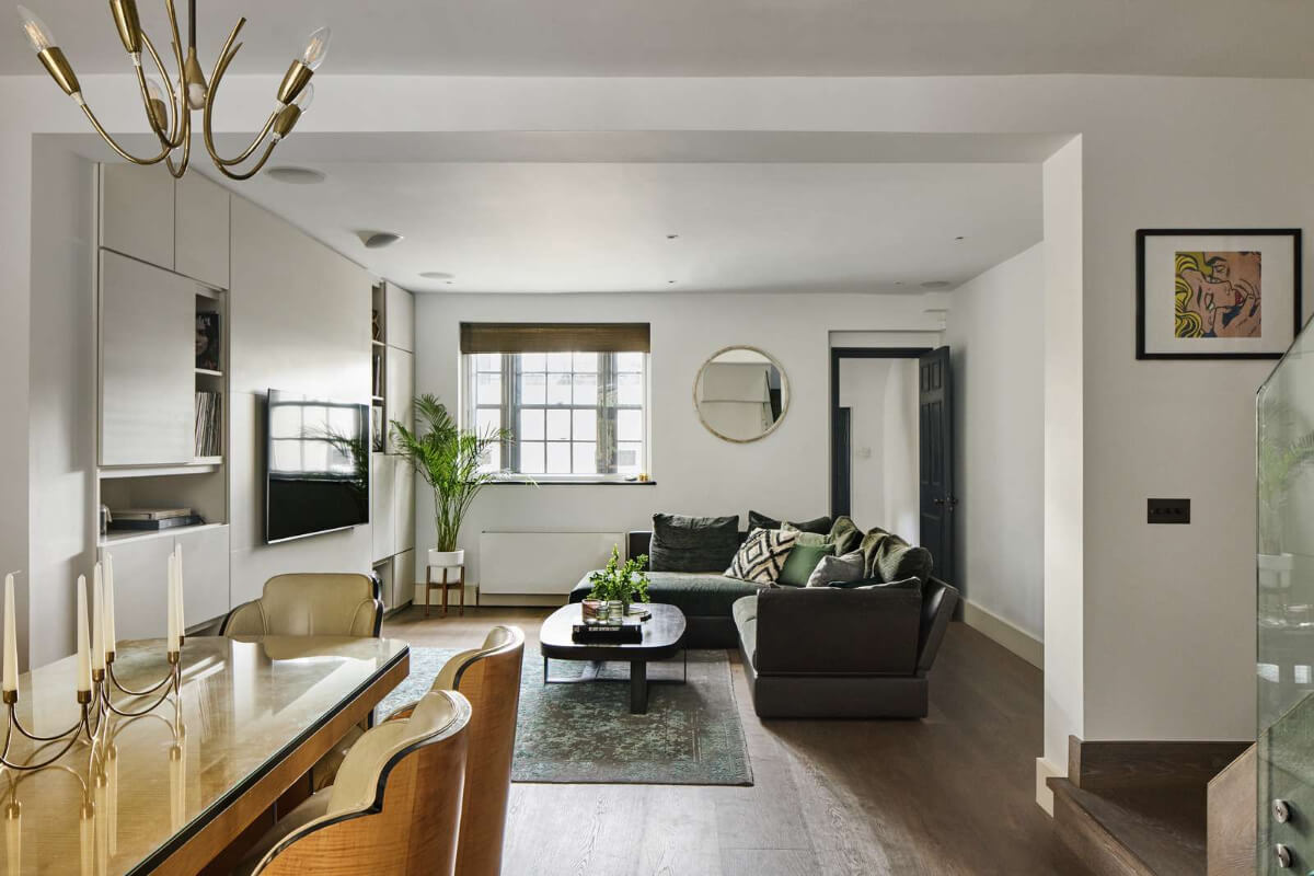 Light and Dark in a Spacious Victorian Townhouse in London 6 basement living space with dining table