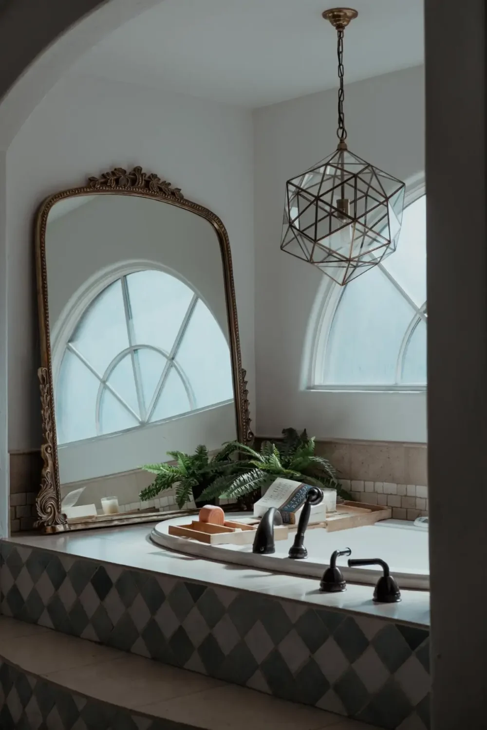 Mediterranean Elegance Meets Modern Living in the Heart of Bonnie Brae 30 bath with gilded mirror