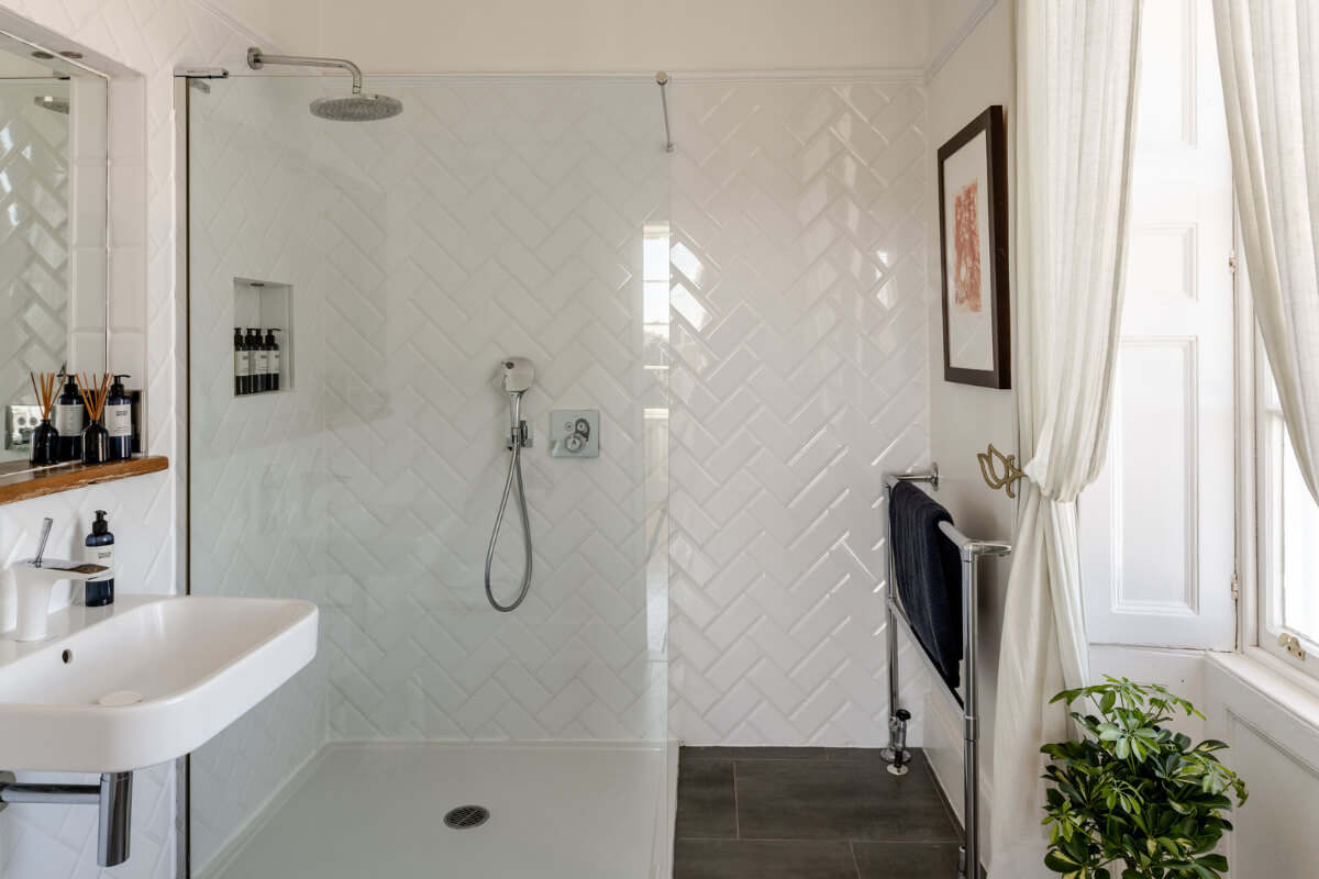 A Grand Georgian Home with Views of the Jurassic Coast 15 bathroom white tile herringbone pattern