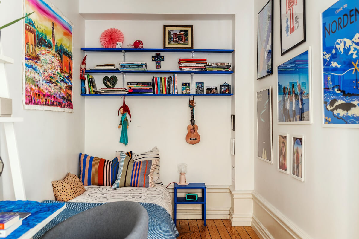 A Bright Family Apartment in Södermalm 12 bedroom blue shelves