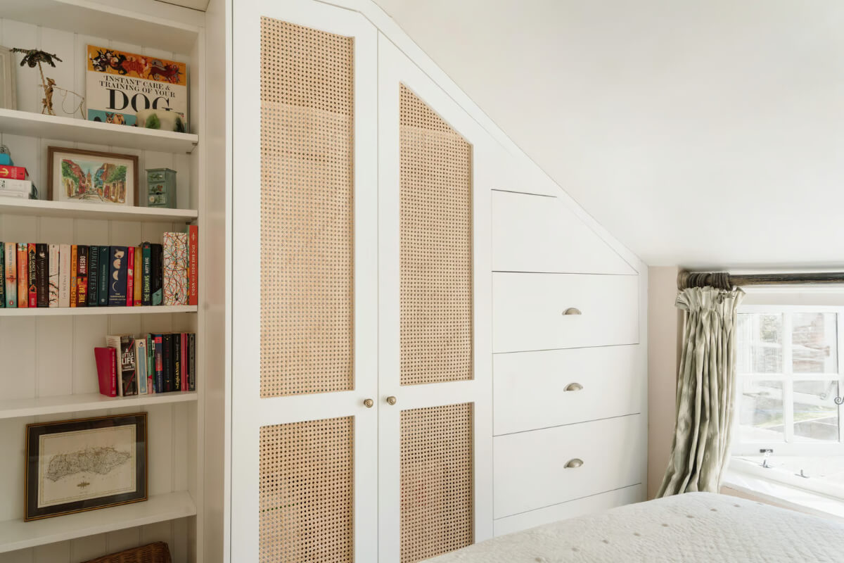 bedroom built-in wardrobes under slanted ceiling