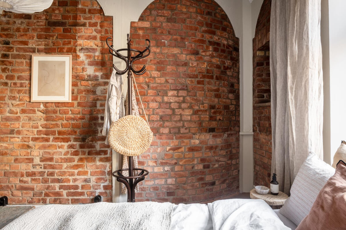 A Stunning Kitchen in a Classic Renovated Turn-of-the-Century Apartment 25 bedroom exposed brick wall features