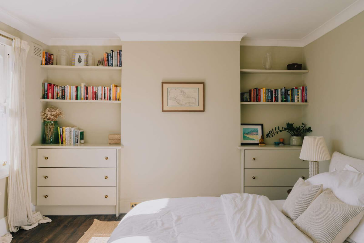 A Serene Color Palette and Built-In Shelves in a London Duplex 15 beige bedroom bookshelves