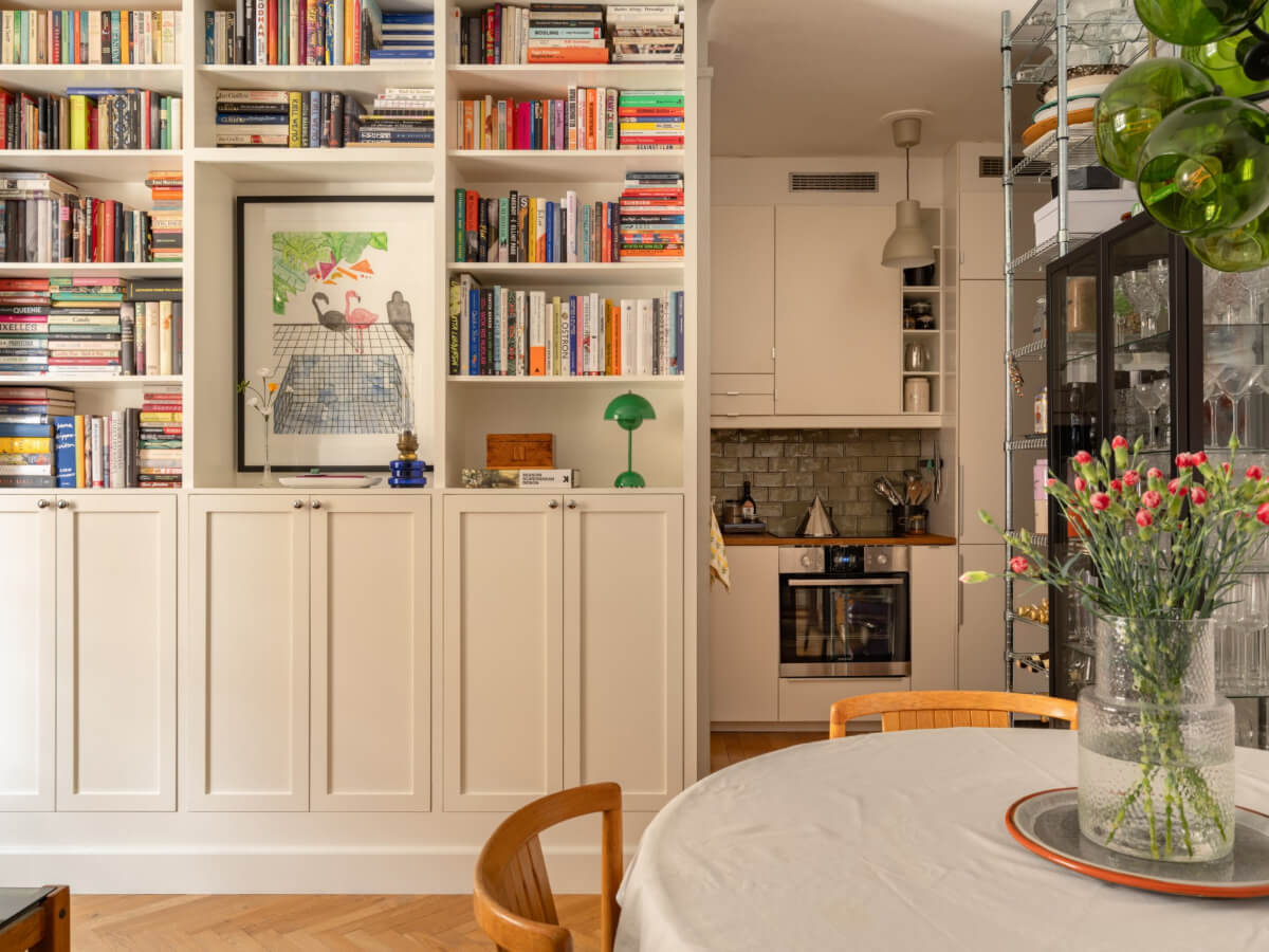 built-in cabinets and bookshelves semi-open floor plan