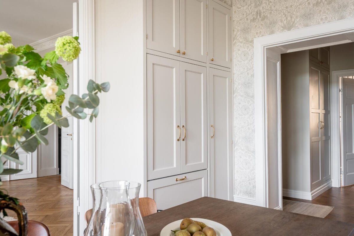 A Stunning Kitchen in a Classic Renovated Turn-of-the-Century Apartment 8 classic kitchen cabinets brass handles
