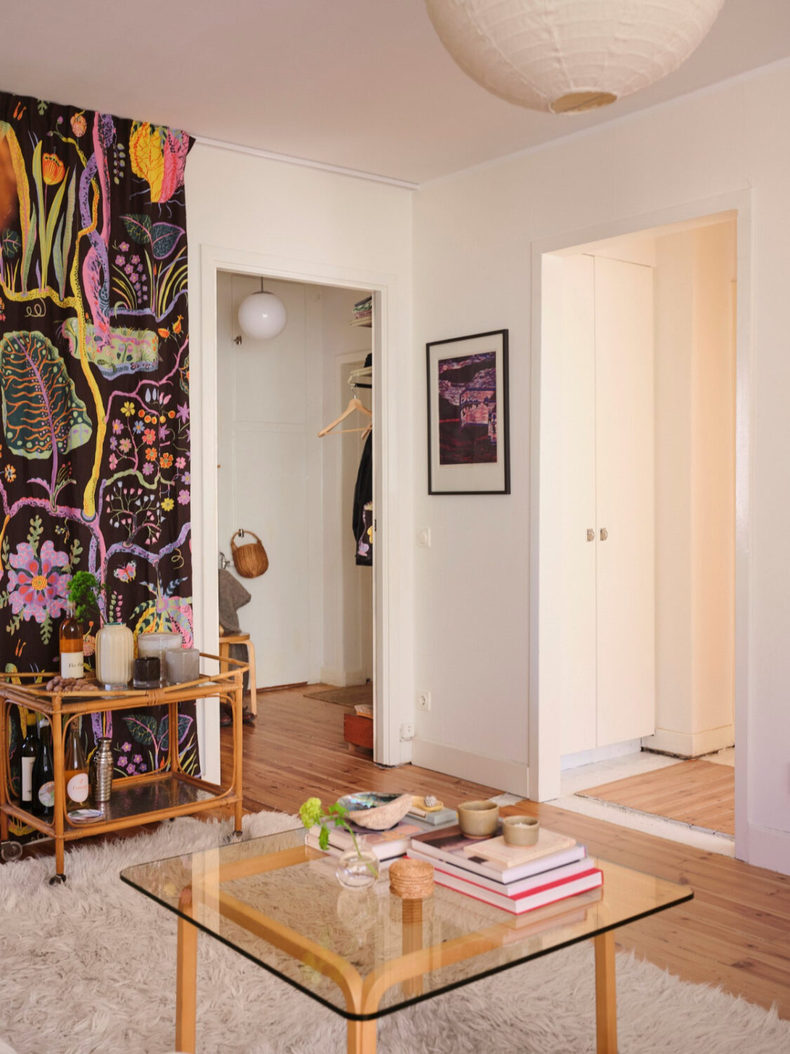 A Light-Filled Functionalist Apartment in Stockholm 7 colorful fabric living room wooden floor