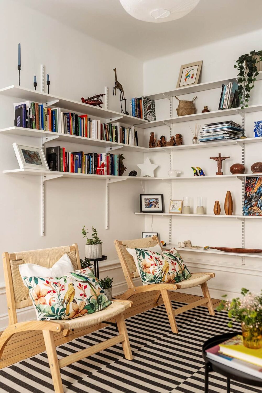A Bright Family Apartment in Södermalm 2 corner shelves living room
