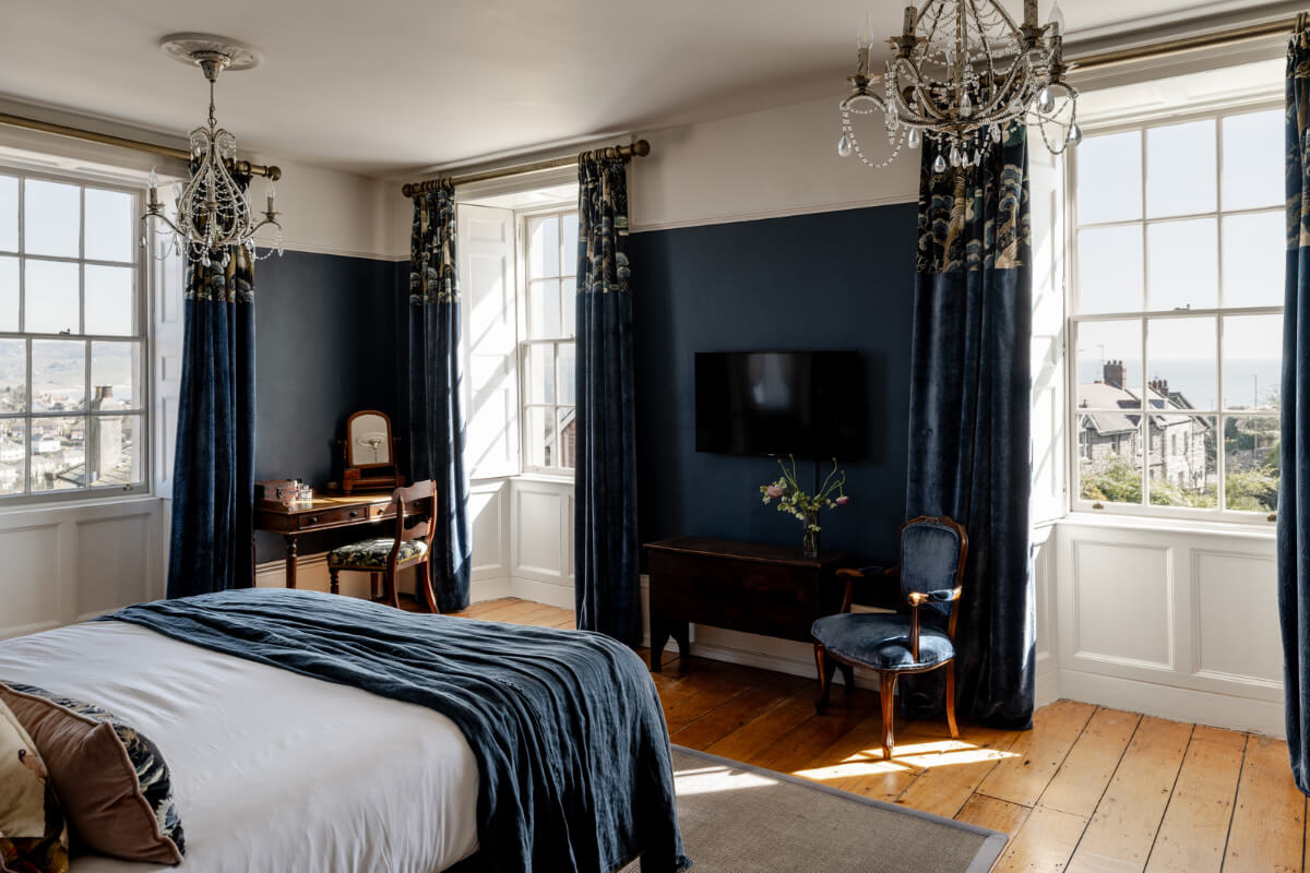 A Grand Georgian Home with Views of the Jurassic Coast 12 dark blue painted walls bedroom huge windows