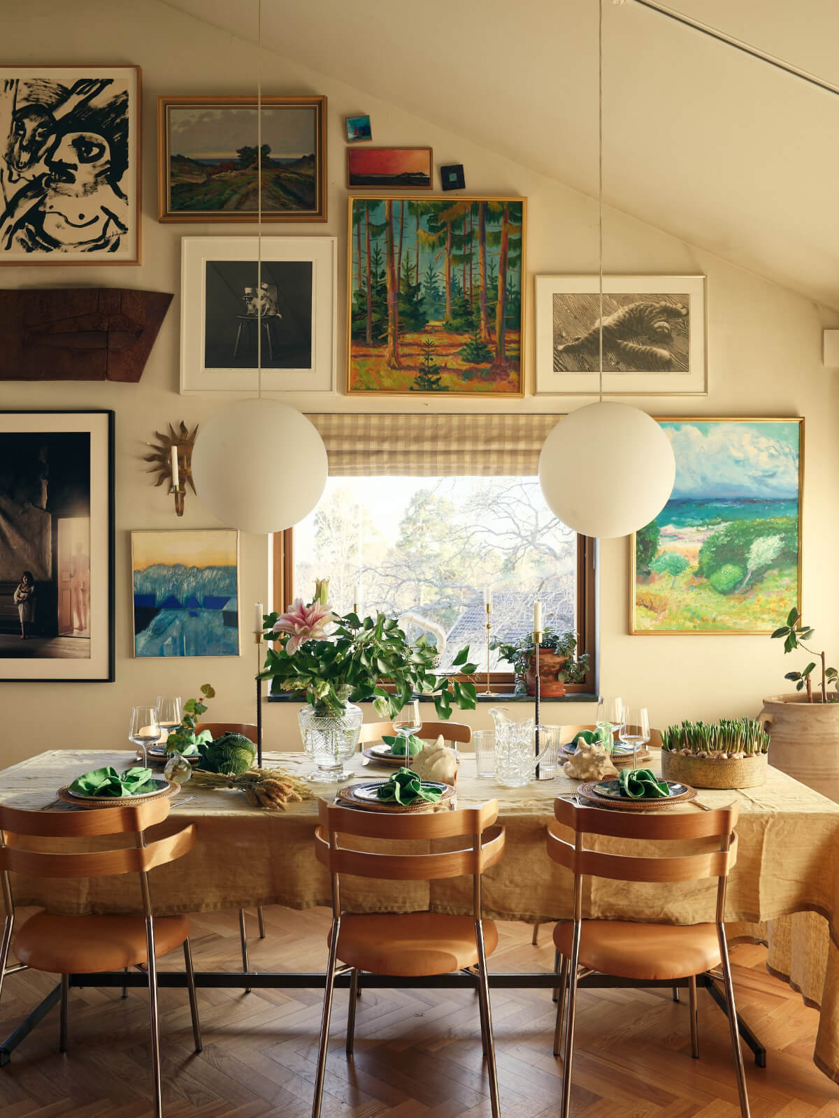 dining table gallery wall pitched ceiling