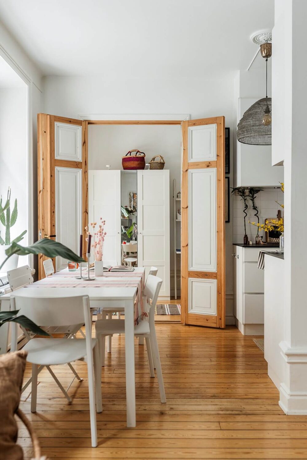 A Bright Family Apartment in Södermalm 6 dining table wooden floor