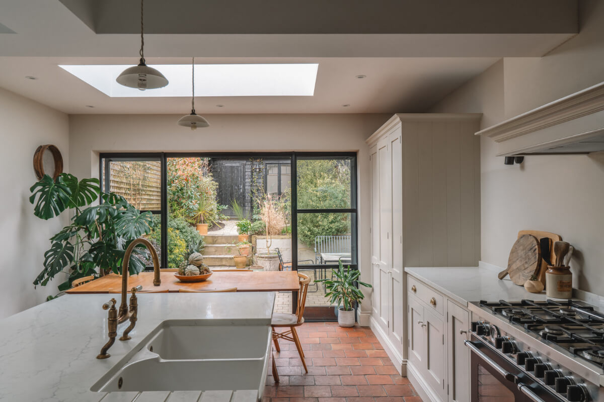 A Kitchen with Terracotta Tiles in a Renovated English Home 9 extended kitchen large dining table terracotta tiles