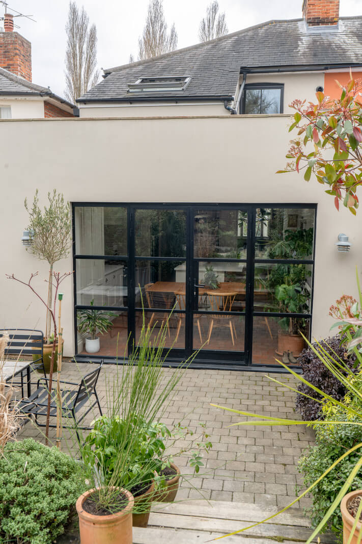 A Kitchen with Terracotta Tiles in a Renovated English Home 21 extended kitchen space crittall doors
