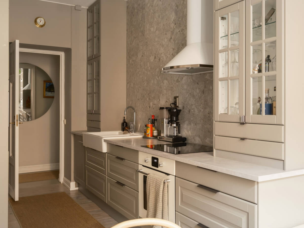 A Muted Palette and a Cozy Kitchen Breakfast Nook in a Swedish Apartment 12 gray kitchen