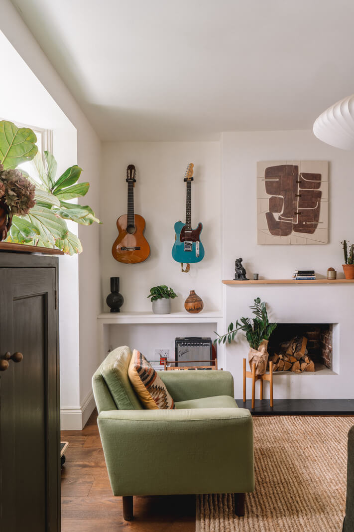 A Kitchen with Terracotta Tiles in a Renovated English Home 2 green sofa white living room