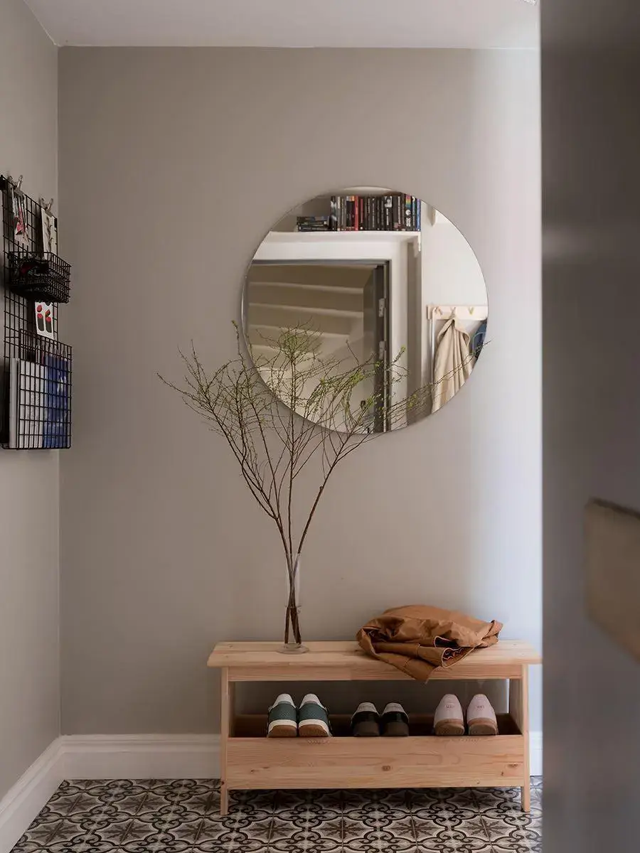 Gray Walls in a Renovated 19th-Century Gothenburg Apartment 21 hall bench with shoe storage floor tiles