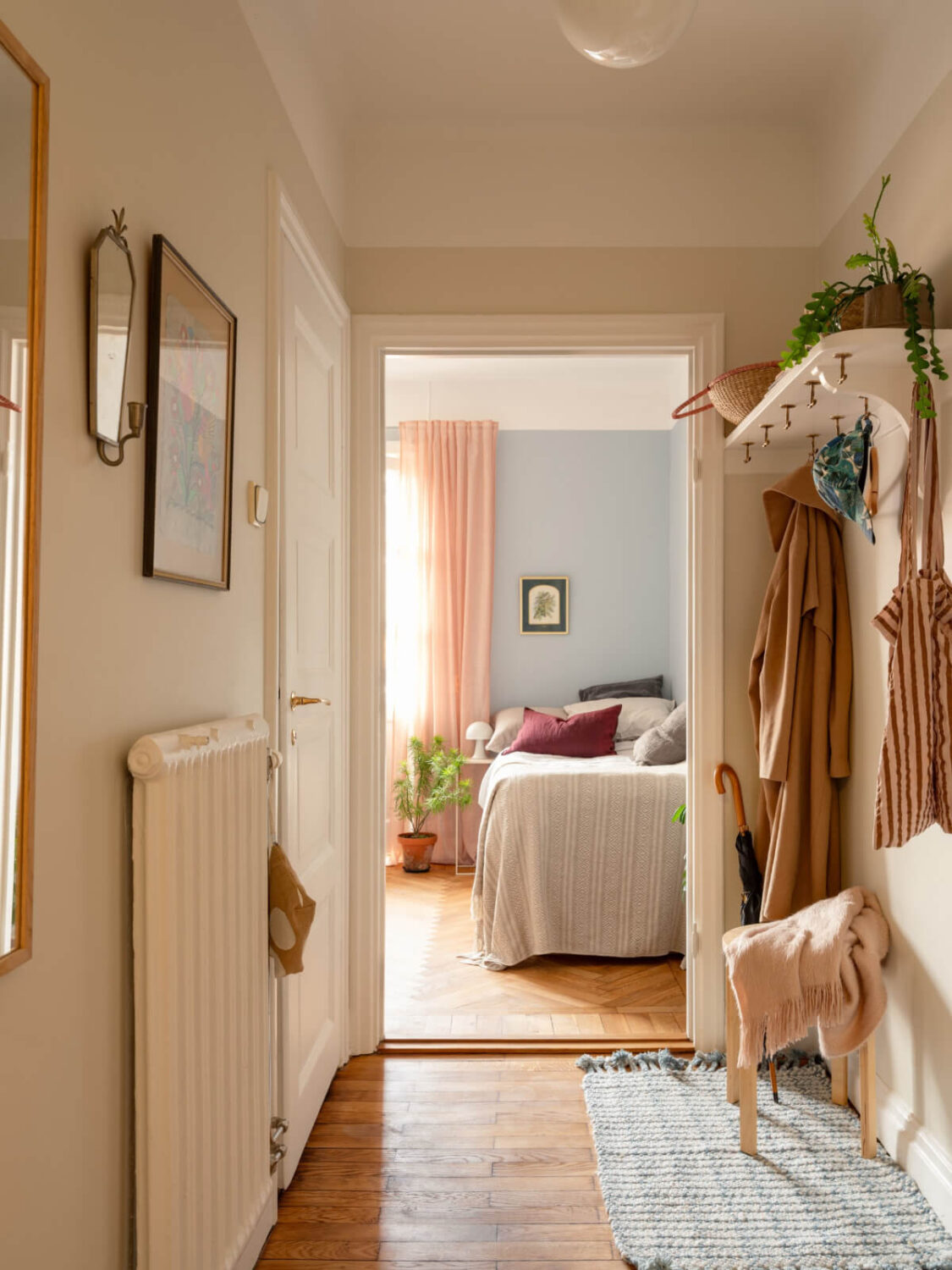 A Blue and Pink Studio Apartment with a Large Balcony 13 hall original hat shelf