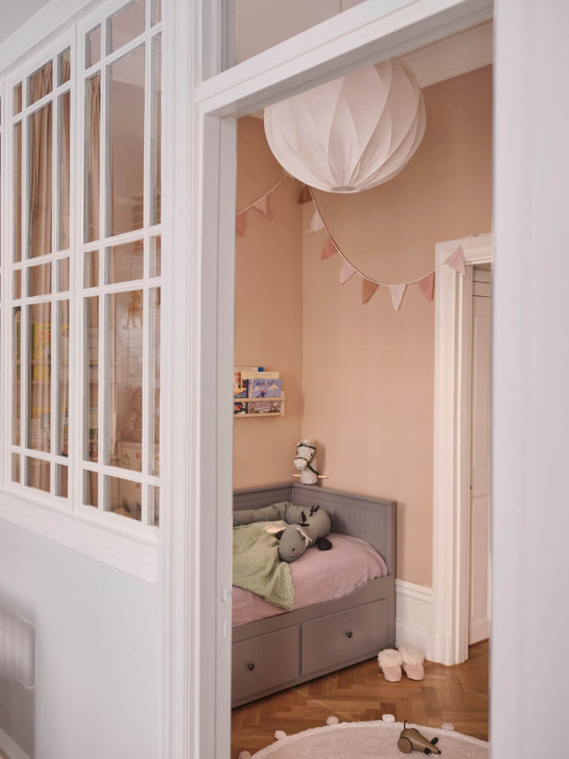 Classic Elements and Light Rooms in a Lovely Family Apartment 11 indoor window room divider pink childrens room