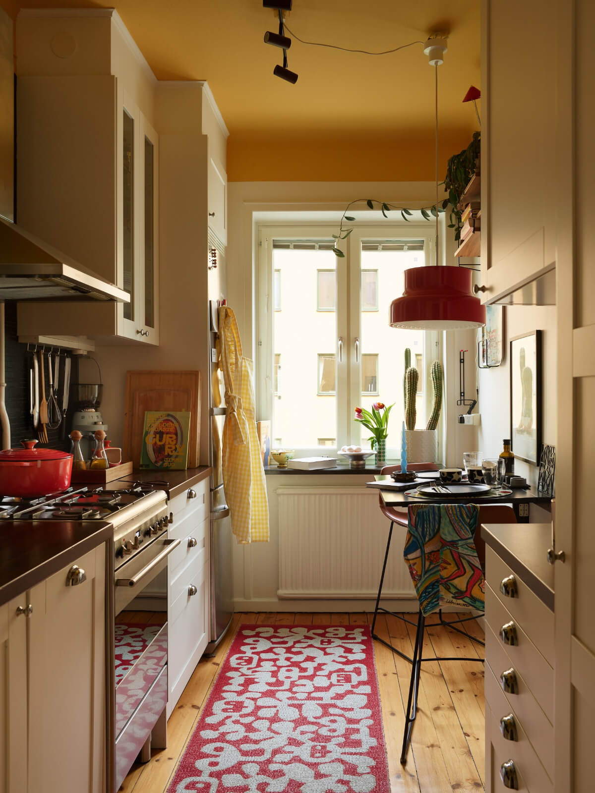 kitchen bright yellow ceiling small bar table