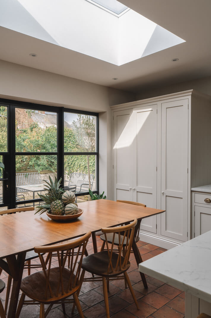A Kitchen with Terracotta Tiles in a Renovated English Home 12 kitchen dining table skylight