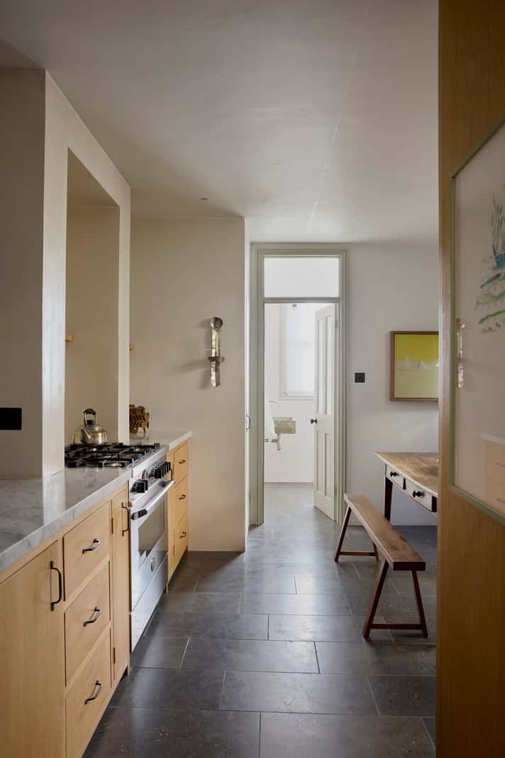 kitchen oak cabinets stone floor