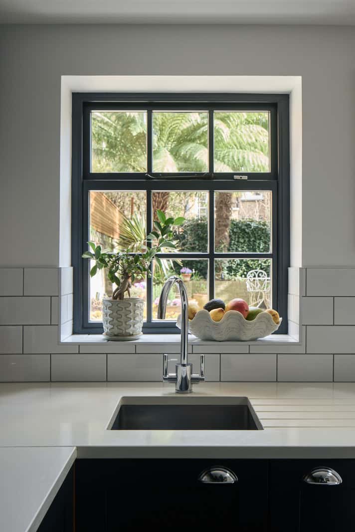 Light and Dark in a Spacious Victorian Townhouse in London 13 kitchen sink under window