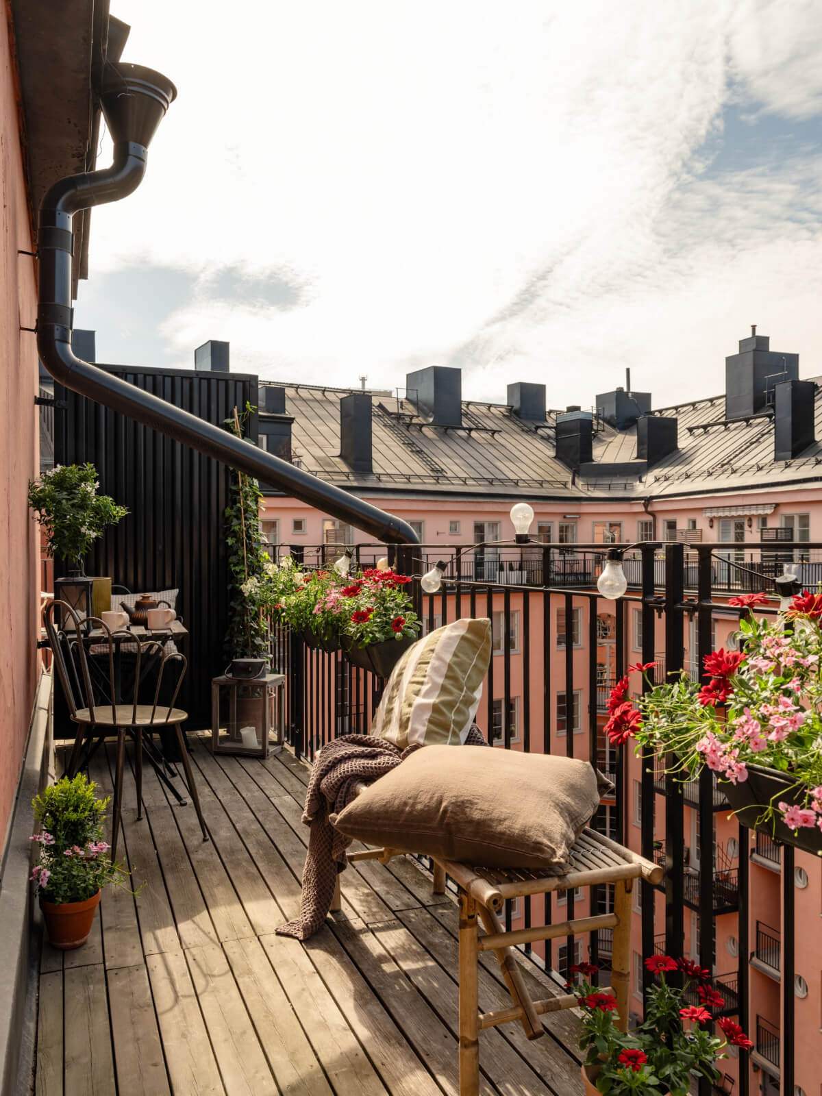 Image showcasing A Blue and Pink Studio Apartment with a Large Balcony - The Nordroom