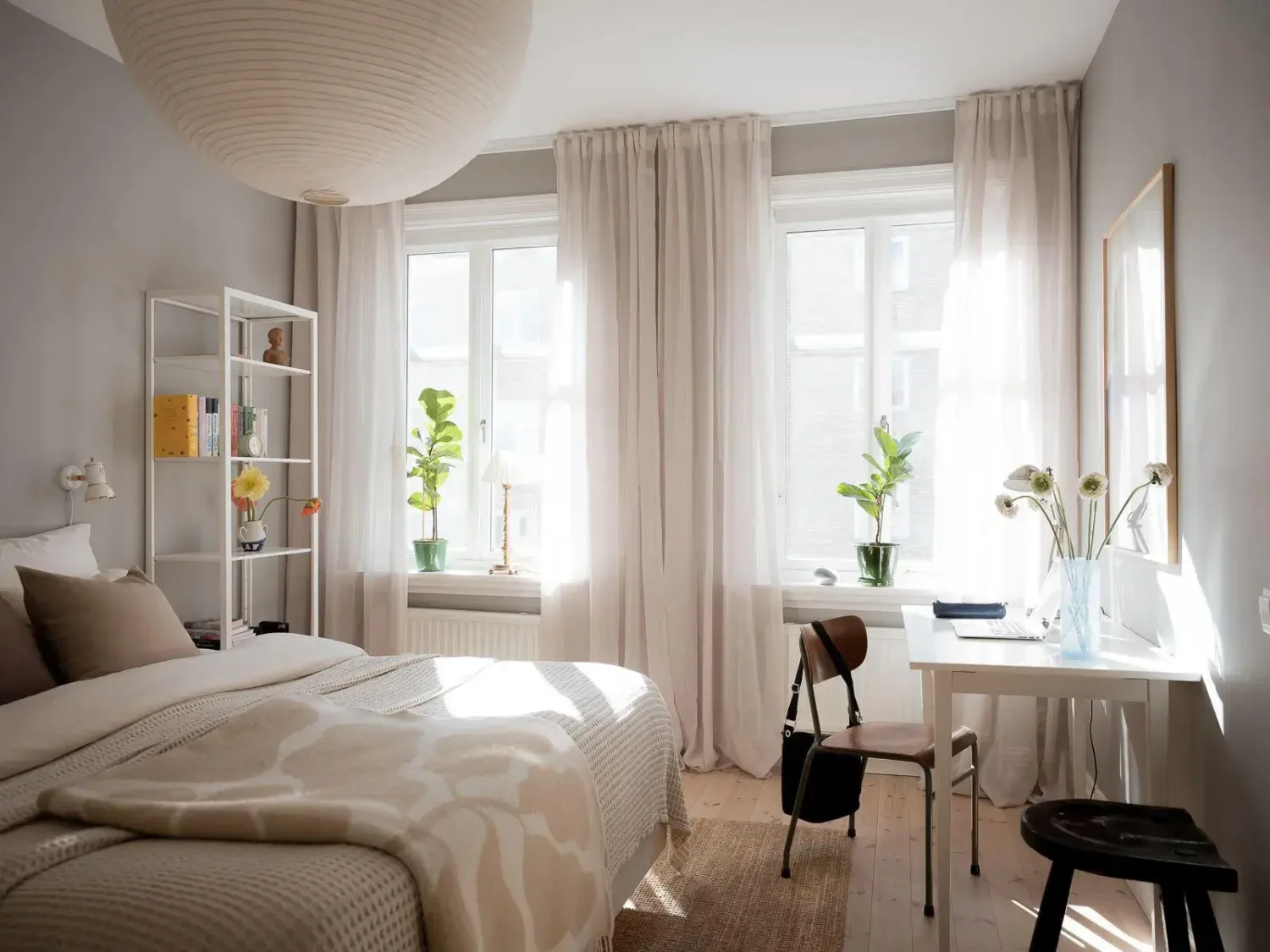 Gray Walls in a Renovated 19th-Century Gothenburg Apartment 10 light-filled bedroom with desk