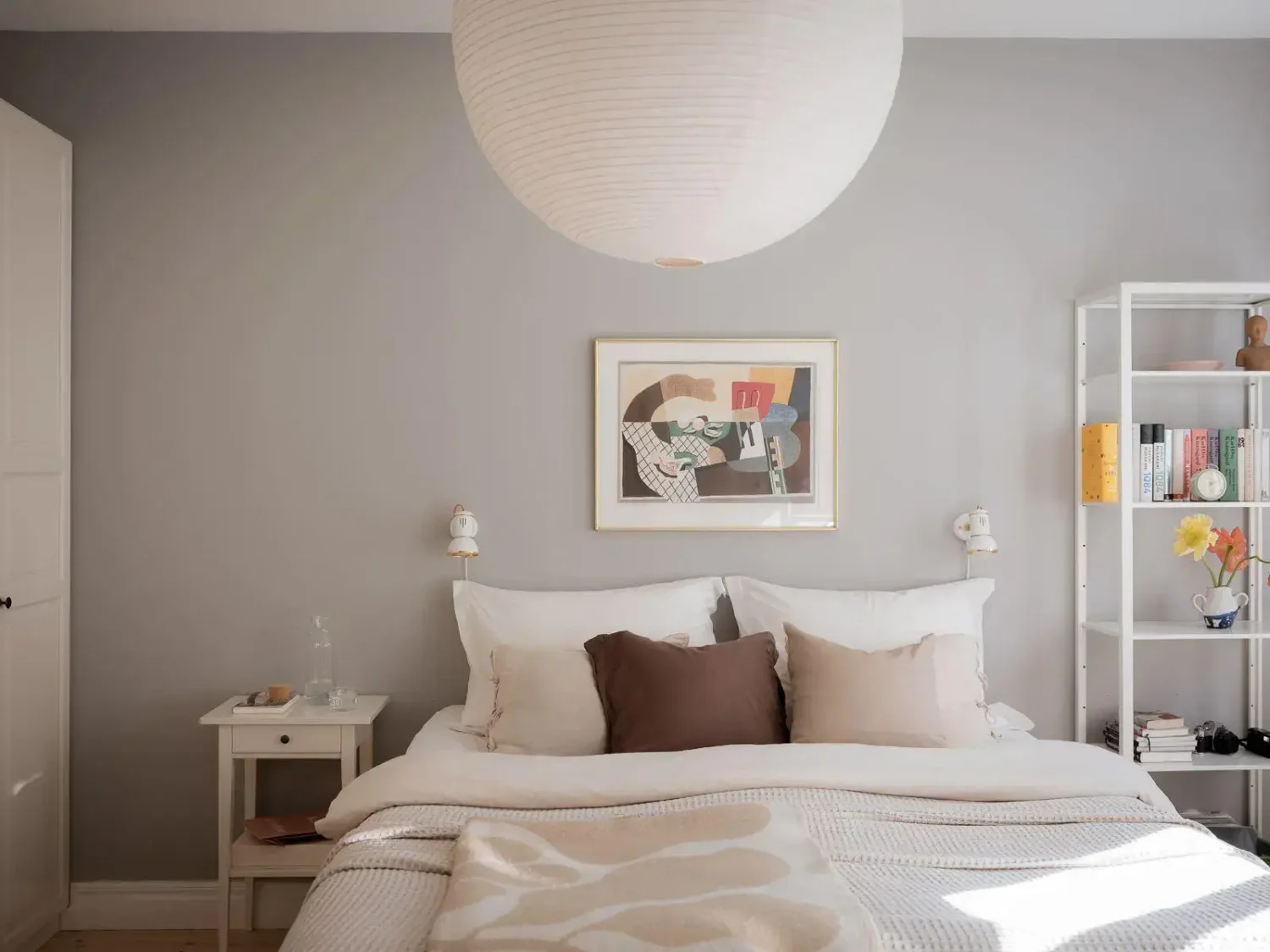 Gray Walls in a Renovated 19th-Century Gothenburg Apartment 12 light gray wall scandi bedroom