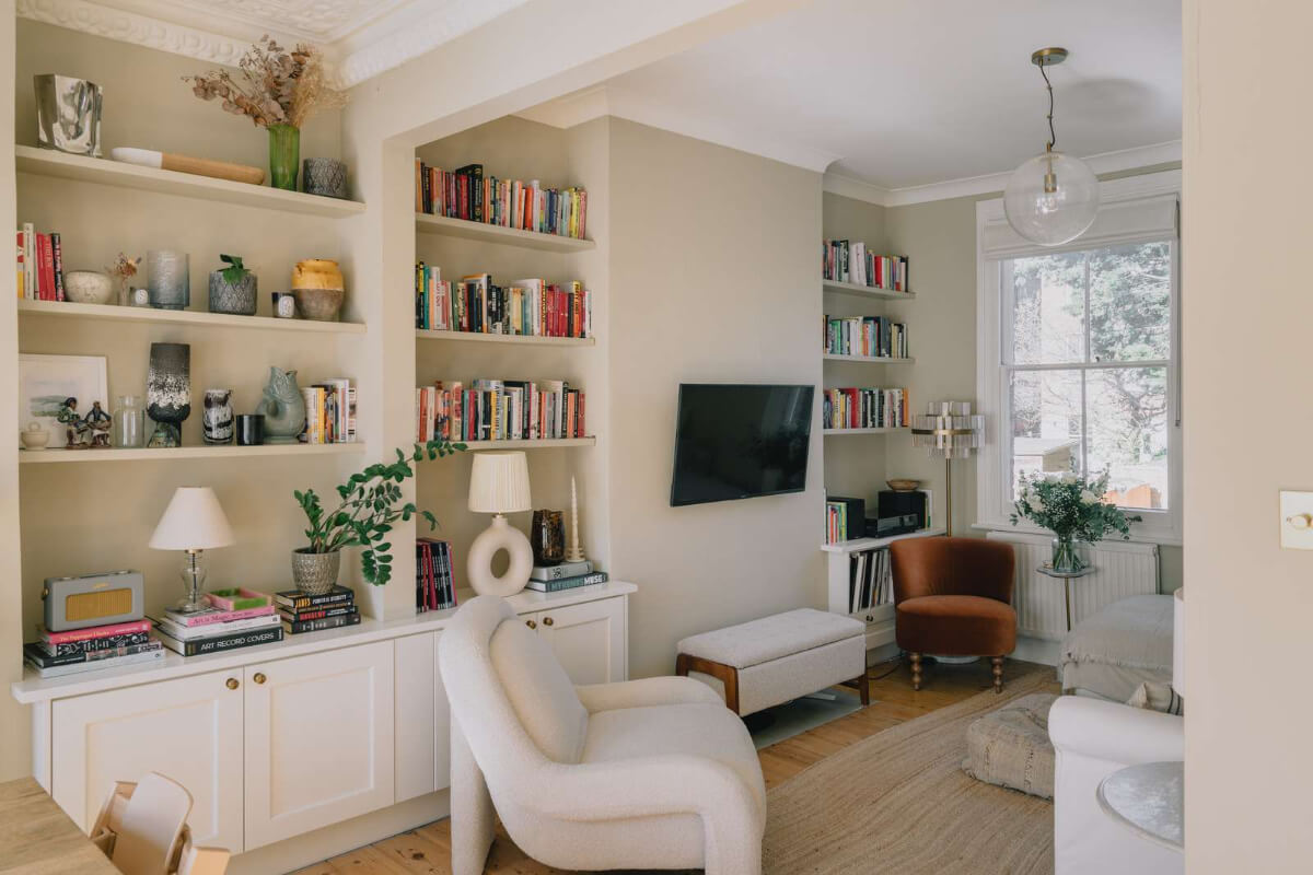 A Serene Color Palette and Built-In Shelves in a London Duplex 1 living room built-in shelves beige walls