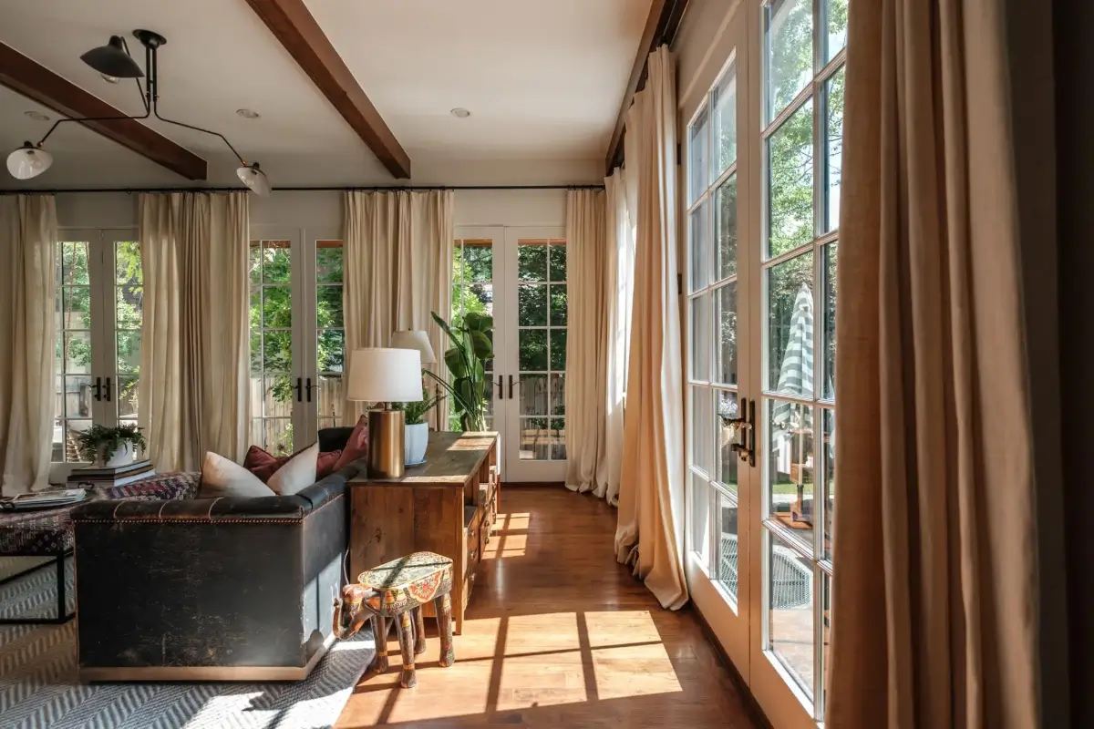 Mediterranean Elegance Meets Modern Living in the Heart of Bonnie Brae 18 living room large windows