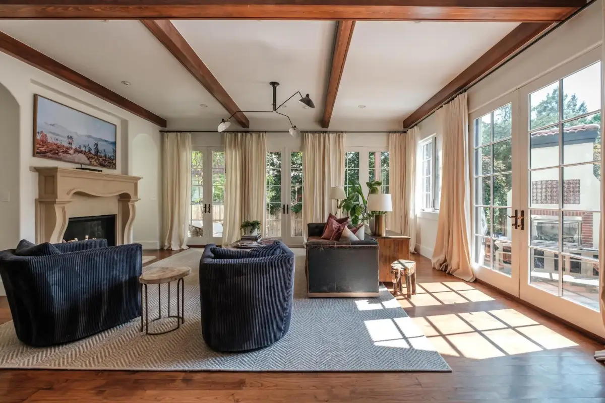 Mediterranean Elegance Meets Modern Living in the Heart of Bonnie Brae 17 living room wooden beams fireplace