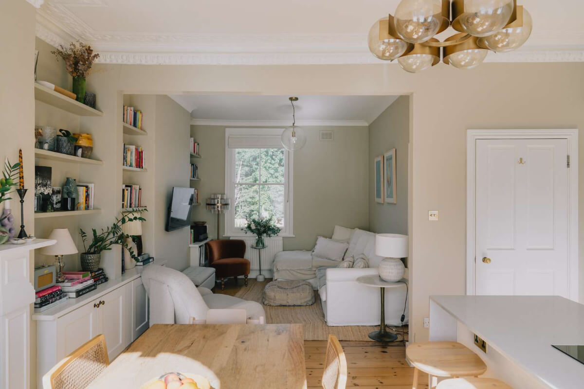 open-plan living room light colors wooden floorboards