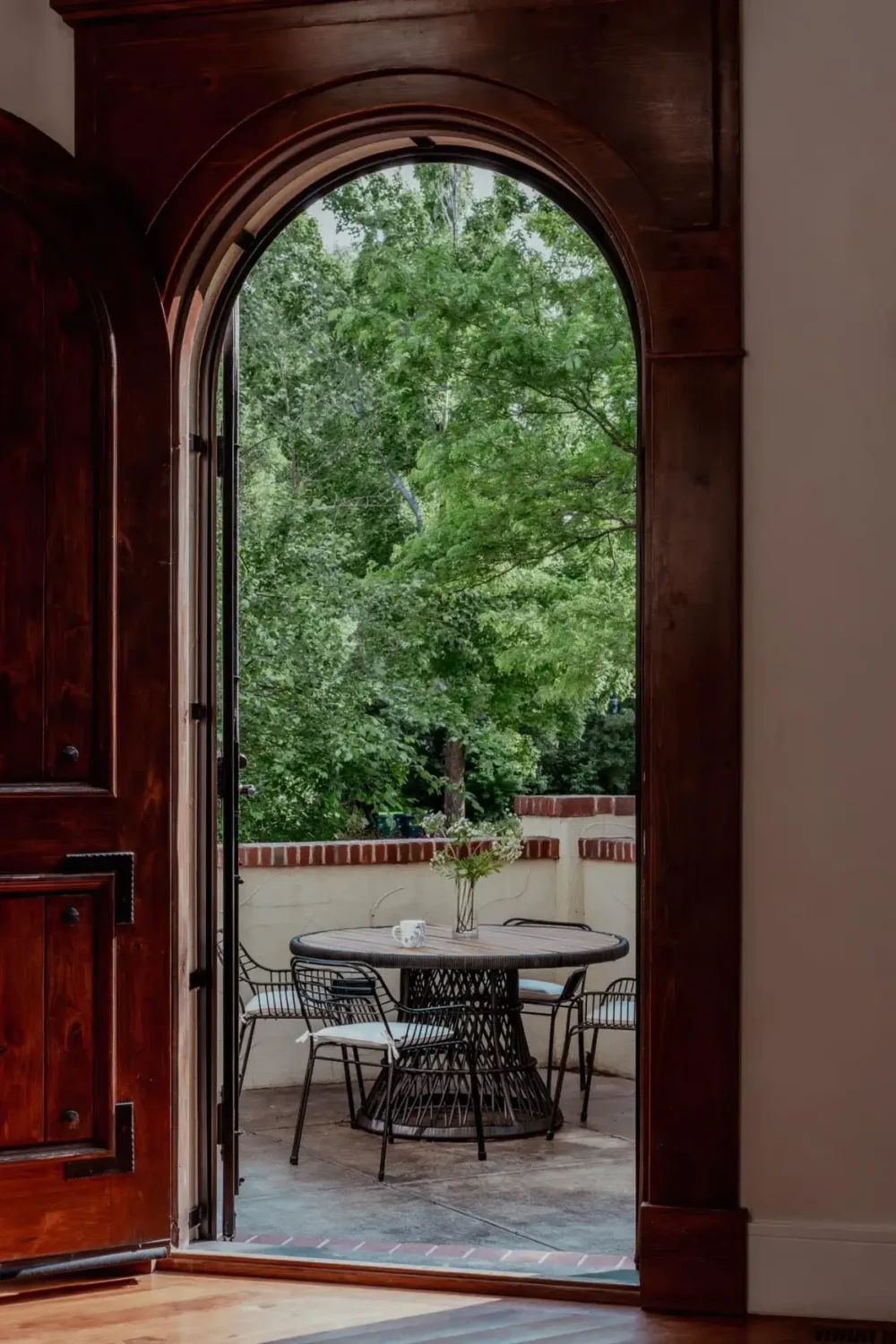 Mediterranean Elegance Meets Modern Living in the Heart of Bonnie Brae 24 rustic arched door terrace Mediterranean Elegance Meets Modern Living in the Heart of Bonnie Brae