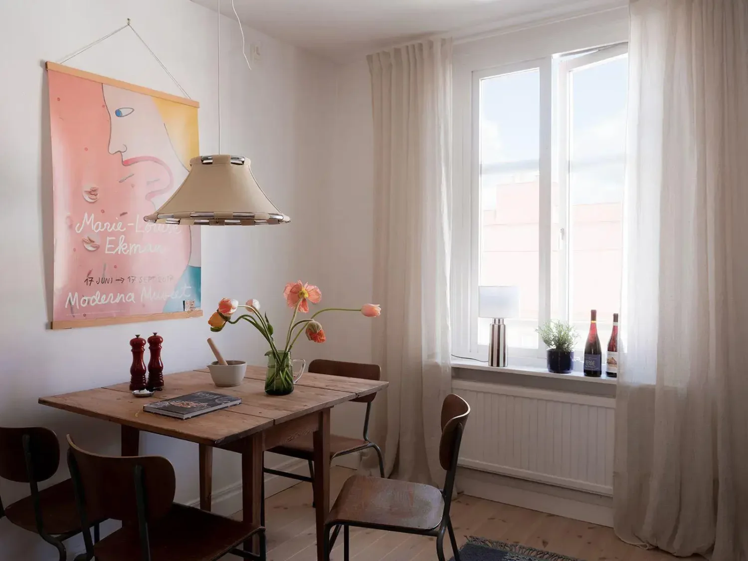 Gray Walls in a Renovated 19th-Century Gothenburg Apartment 15 rustic kitchen table
