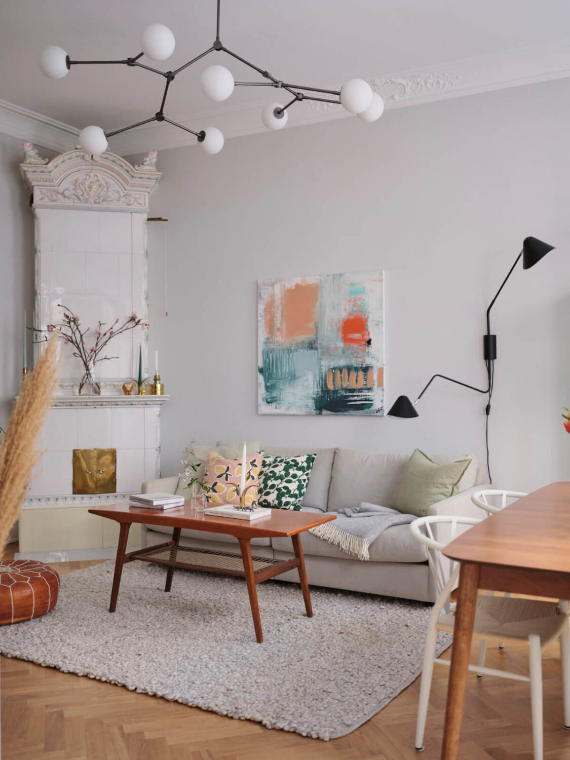 Classic Elements and Light Rooms in a Lovely Family Apartment 2 scandinavian living room fireplace