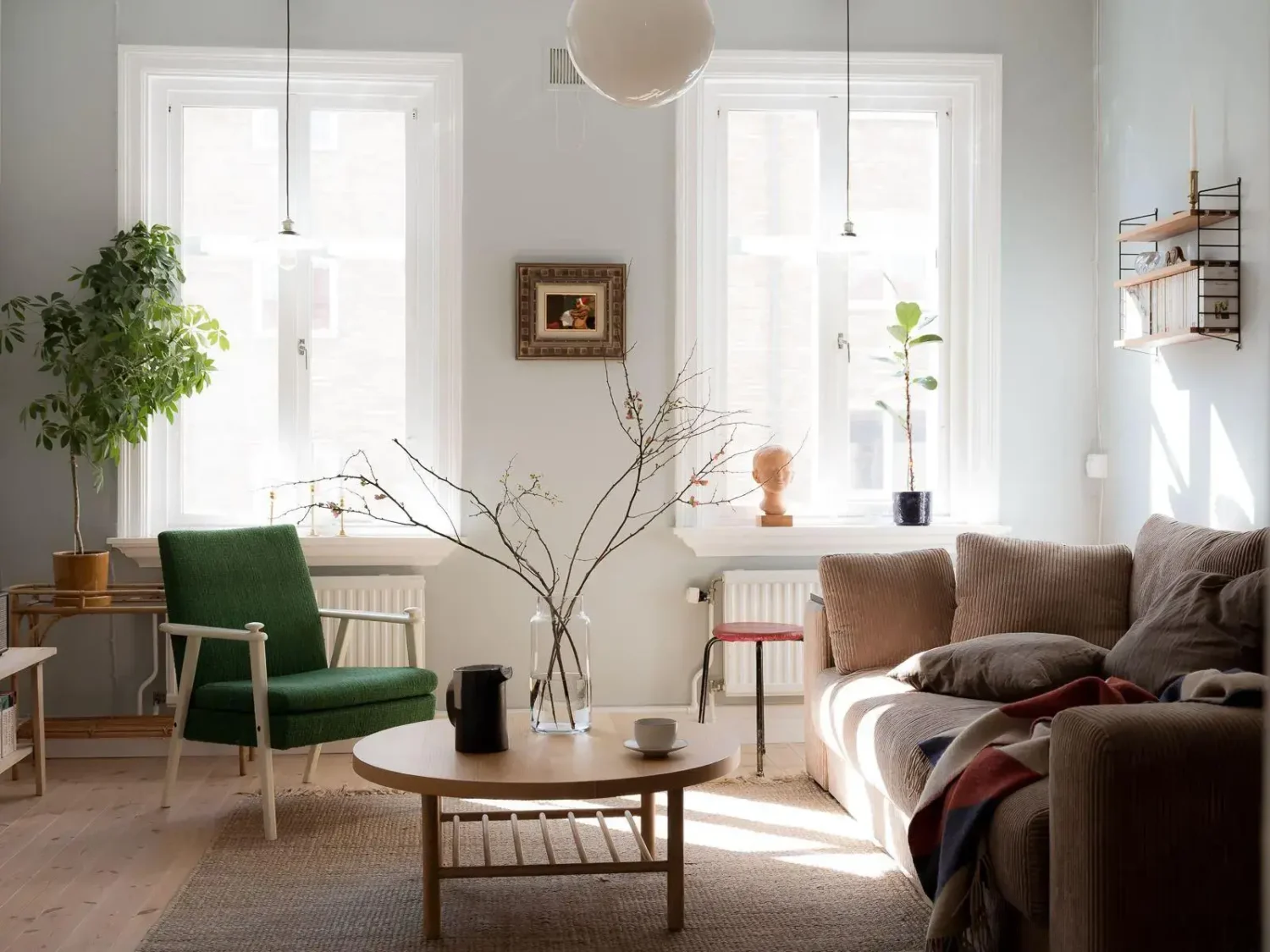 Gray Walls in a Renovated 19th-Century Gothenburg Apartment 4 sun-filled living room