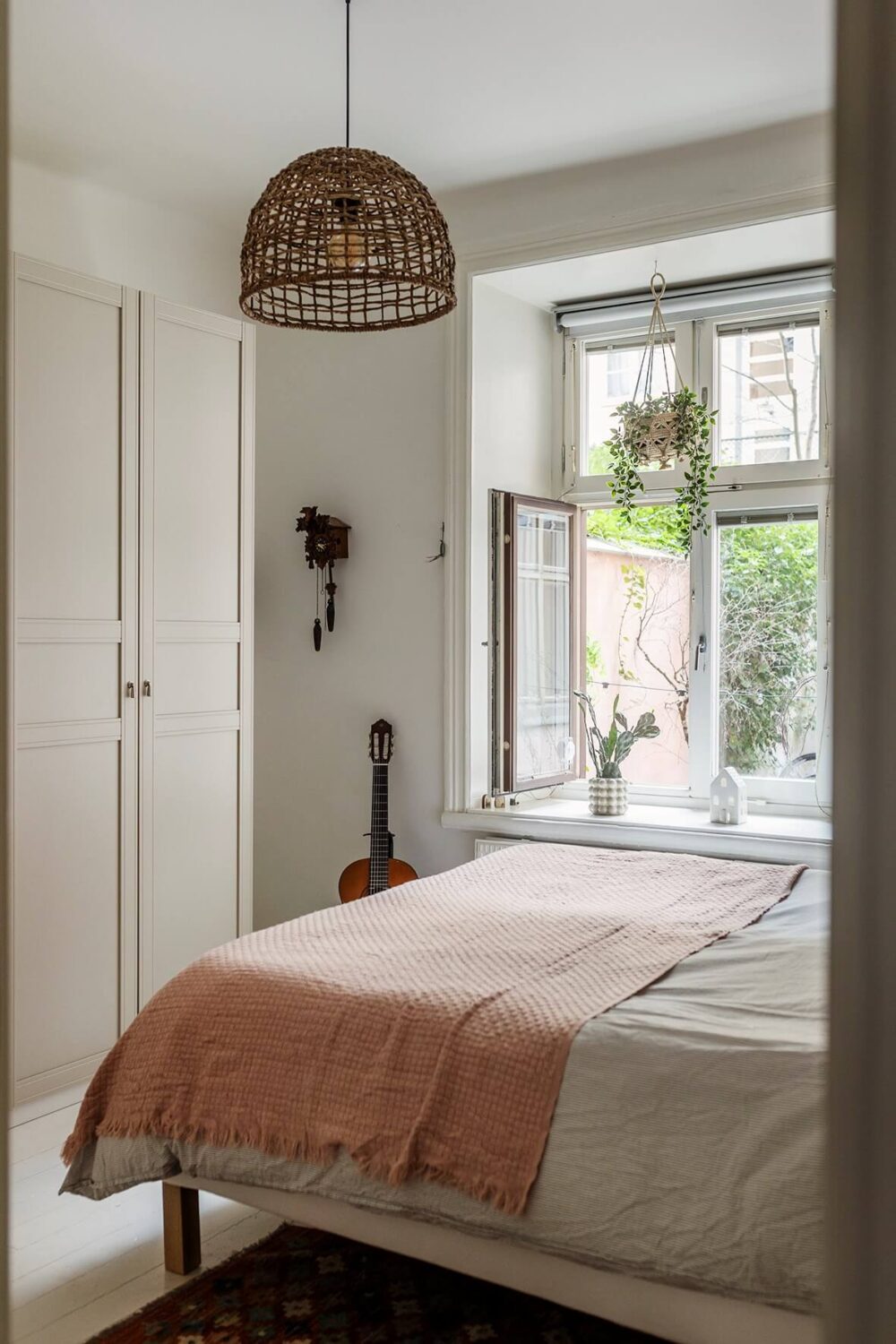A Bright Family Apartment in Södermalm 13 view into bedroom
