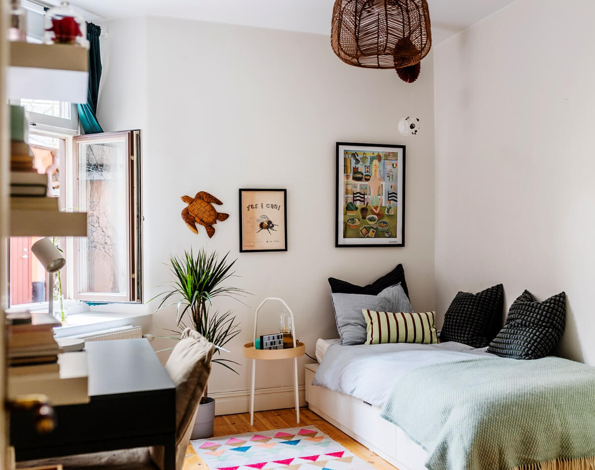 A Bright Family Apartment in Södermalm 17 white bedroom large window