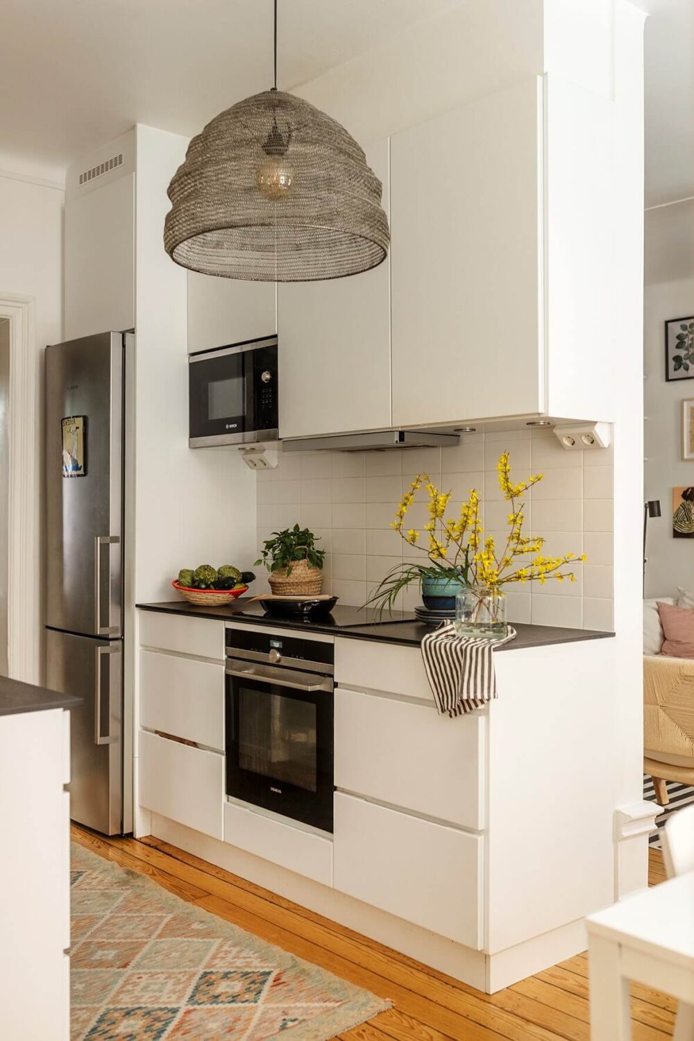 A Bright Family Apartment in Södermalm 8 white kitchen