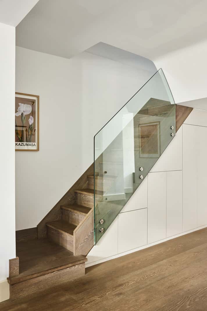 Light and Dark in a Spacious Victorian Townhouse in London 8 wooden stairs glass balustrade