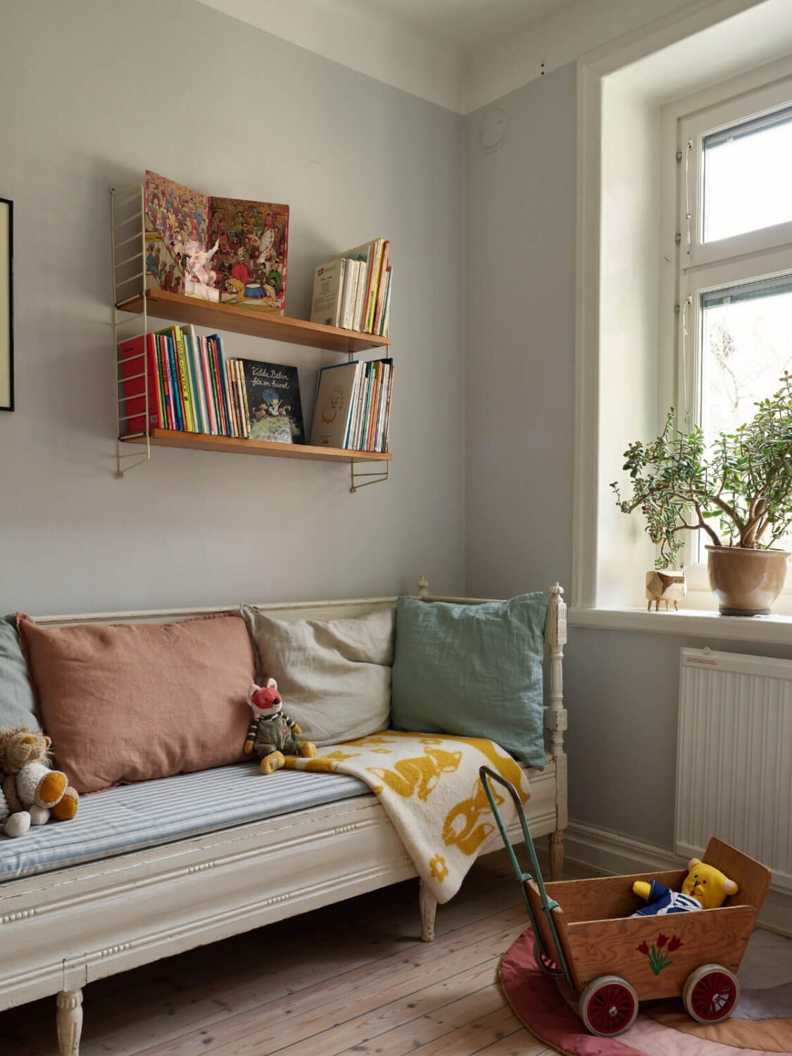 An Art Nouveau Apartment with a Deep Green Kitchen 21 antique wooden bench