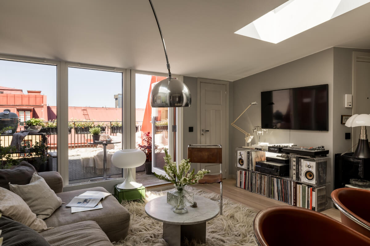 cozy gray living room with large balcony