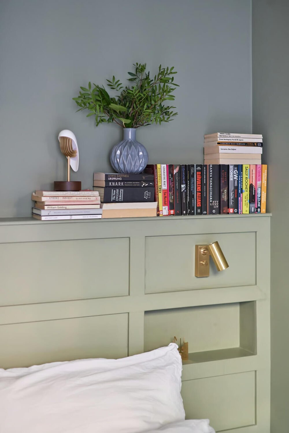 A Green Swedish Corner Apartment with an Open Floor Plan 15 custom headboard