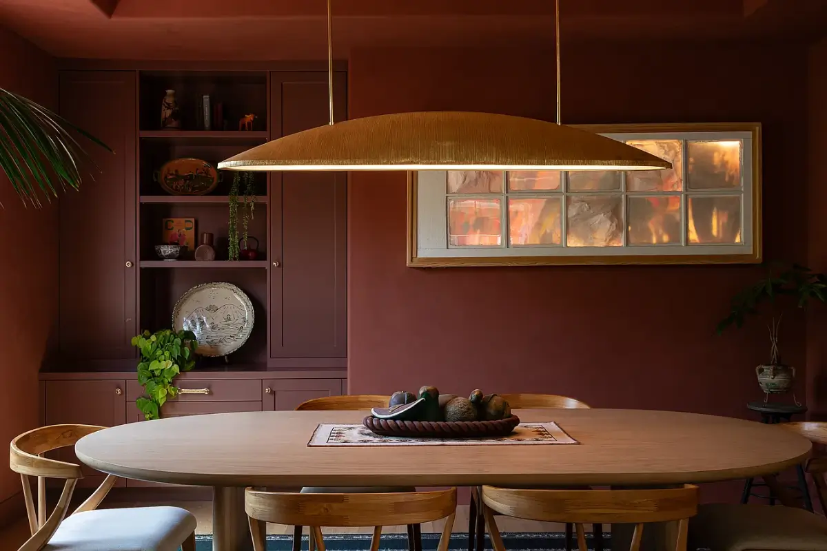 A Creative Sanctuary in Sherman Oaks Designed by Mendy Cheng 14 dark pink dining room