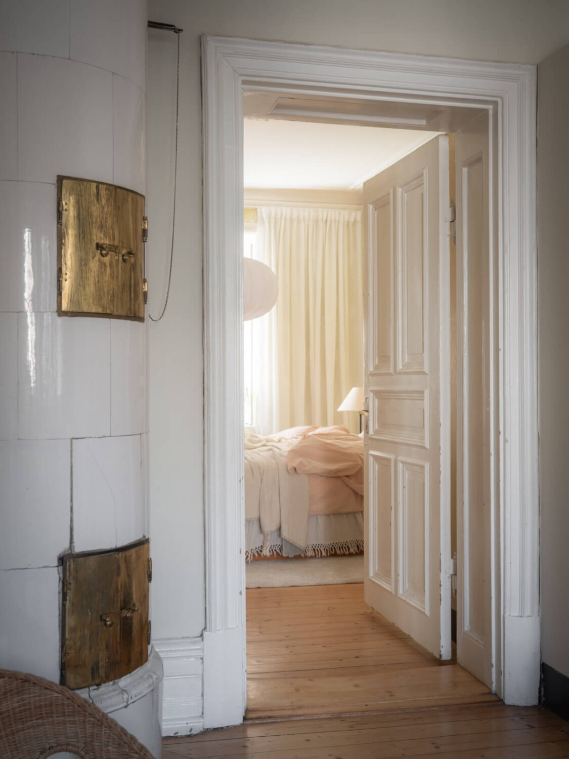 A Historic Apartment with Classic Wallpapers and Contemporary Furniture 12 doorway to bedroom